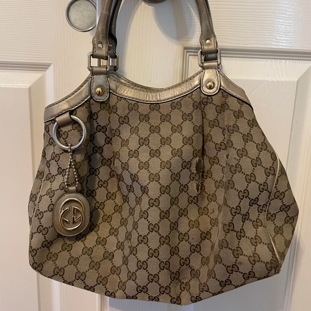 Large Gucci Bag used and torn fabric on outside